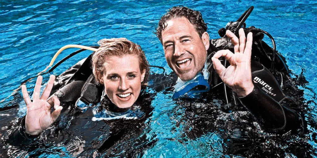 Happy diver couple at the surface with Bali Bubbles Dive Center